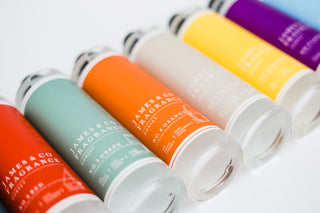 Our No. 6 Orange 200ml diffuser refill sat with sweet tangerine slices, cinnamon sticks, and a handful of cloves