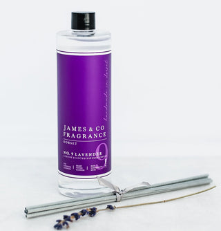 Our No. 9 Lavender 200ml diffuser refill sat with a sprig of fresh lavender