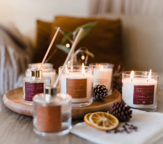 Winter Spice and Gingerbread ranges from James and Co Fragrance against a seasonal background