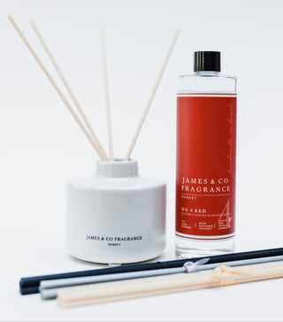 Reed diffuser set with a bottle labeled 'James & Co Fragrance' on a white background