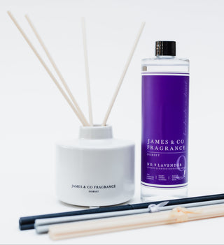 Reed diffuser set with a purple bottle labeled 'James & Co Fragrance' on a white background