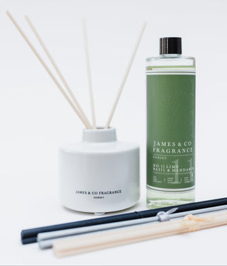 Reed diffuser set with a bottle labeled 'James & Co Fragrance' on a white background