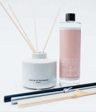 Reed diffuser set with a bottle labeled 'James & Co Fragrance' on a light background