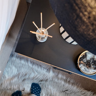 A vertical view of a reed diffuser.